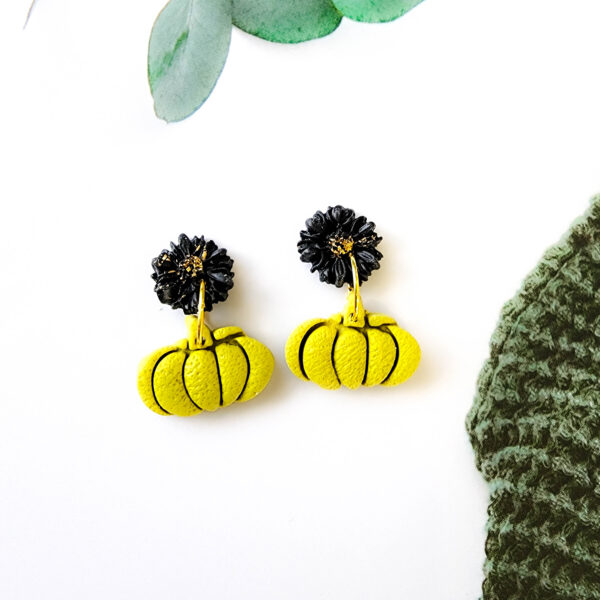 Discover Orellie's handcrafted Halloween earrings featuring pumpkin and flower designs. New Zealand-made, perfect for adding a spooky yet stylish touch to your seasonal outfits.