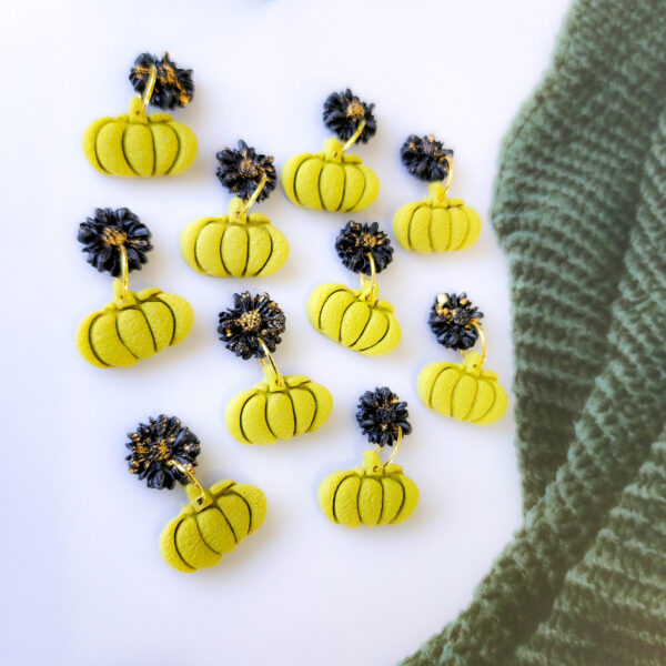 Discover Orellie's handcrafted Halloween earrings featuring pumpkin and flower designs. New Zealand-made, perfect for adding a spooky yet stylish touch to your seasonal outfits.