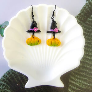 Orellie's handmade witch hat and pumpkin earrings, New Zealand-made and available in different colors. Choose your favorite spooky design for the perfect Halloween accessory.