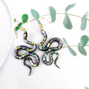 Orellie's handmade glitter snake earrings, New Zealand-made with five stunning variations. Add a bold and sparkling touch to your style with these unique accessories.