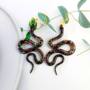 Orellie's handmade glitter snake earrings, New Zealand-made with five stunning variations. Add a bold and sparkling touch to your style with these unique accessories.