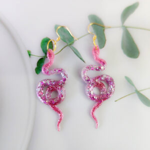 Orellie's handmade shimmer snake earrings, New Zealand-made with five variations. Add a dazzling and bold touch to your outfit with these unique accessories.