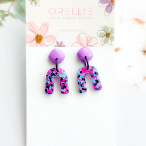 Brighten up your day with Orellie's handmade confetti arch earrings, designed and made in New Zealand. A perfect pop of color for any outfit.