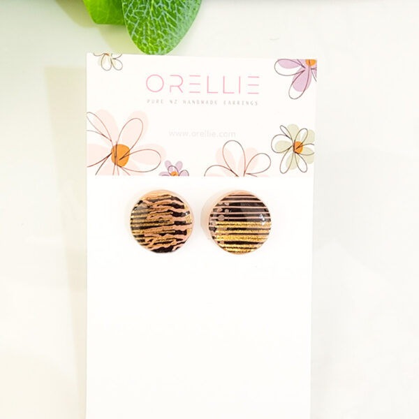 Orellie's handmade gold-striped stud earrings, crafted with care in New Zealand. These stylish and versatile earrings add a touch of elegance to any outfit.