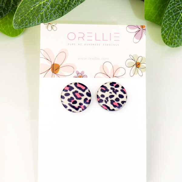 Orellie's handmade pink leopard print stud earrings, crafted in New Zealand. Stylish and vibrant, perfect for adding a pop of color to any outfit.