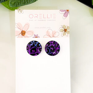 Add a touch of boldness to your look with Orellie's handmade purple and blue leopard print stud earrings. Unique and stylish, perfect for any occasion.