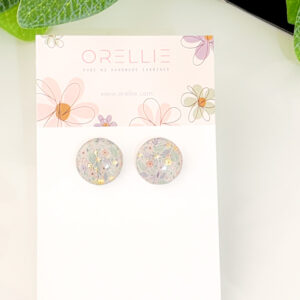 Brighten up your outfit with these delicate pastel floral stud earrings from Orellie. Handcrafted with a unique floral design, perfect for everyday wear.