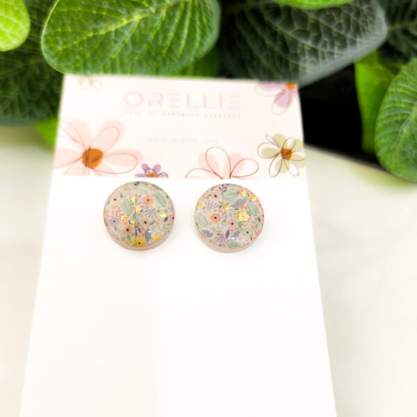 Brighten up your outfit with these delicate pastel floral stud earrings from Orellie. Handcrafted with a unique floral design, perfect for everyday wear.