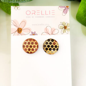 Add a touch of nature-inspired style with these handcrafted honeycomb stud earrings from Orellie. Unique and perfect for everyday wear.