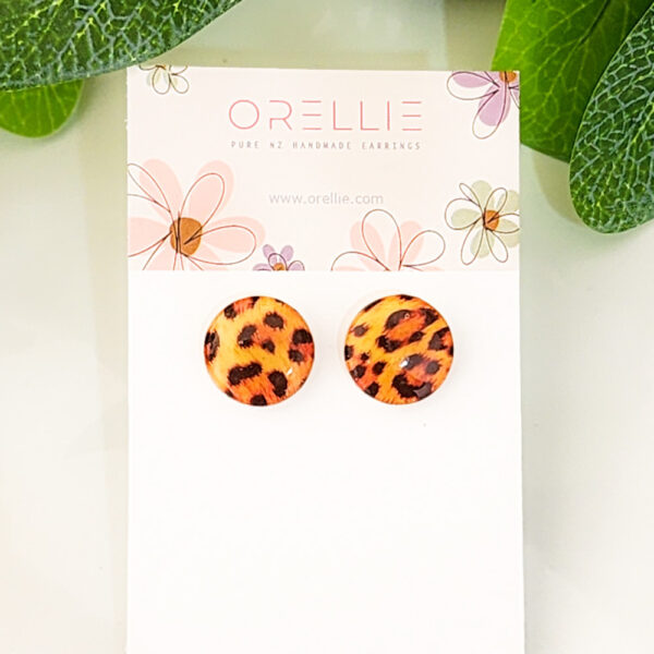 Elevate your style with these Classic Leopard Print stud earrings. Handcrafted by Orellie, featuring a vibrant leopard pattern for a bold, chic look.