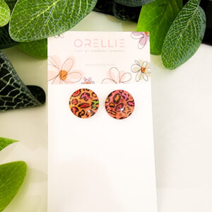 Brighten up your style with these Neon Leopard stud earrings. Handcrafted by Orellie, showcasing a vivid leopard print in vibrant neon colors.