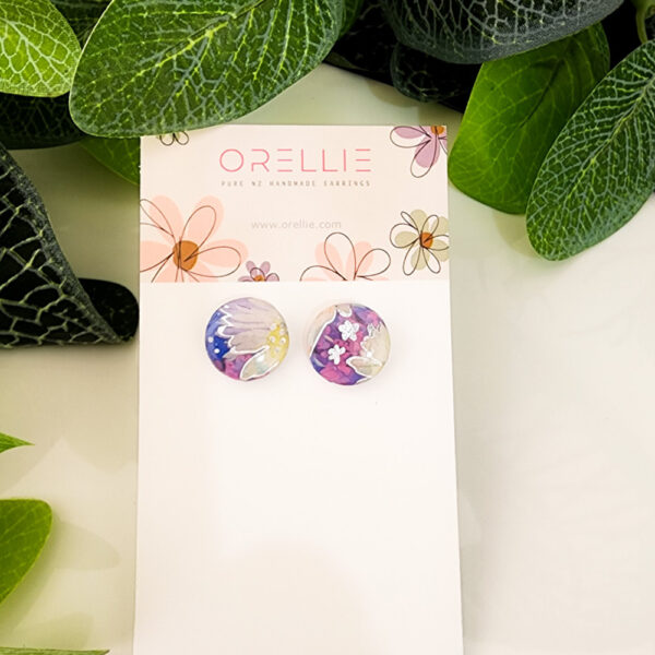 Embrace a touch of nature with these Floral Dreams stud earrings. Handcrafted by Orellie, featuring delicate floral patterns in vibrant colors.