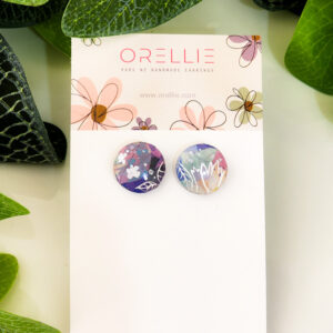 Embrace a touch of nature with these Floral Dreams stud earrings. Handcrafted by Orellie, featuring delicate floral patterns in vibrant colors.