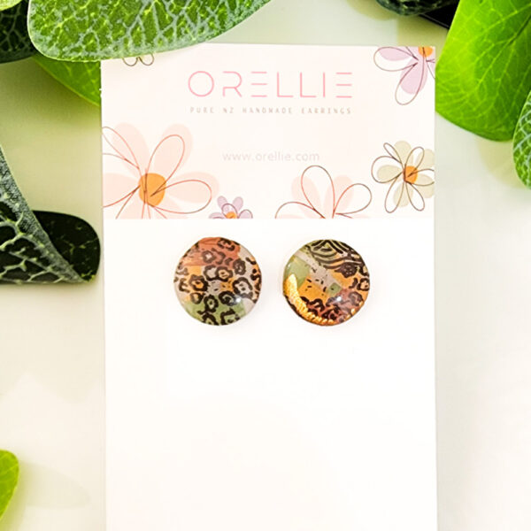 Embrace the wild elegance of autumn with these Autumn Safari stud earrings. Handcrafted by Orellie, featuring a blend of animal prints and earthy tones.