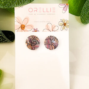 Express your boho-chic style with these beautifully handcrafted Pink Mandala stud earrings from Orellie. Featuring intricate mandala patterns, they are perfect for adding a touch of artistic elegance to any outfit.