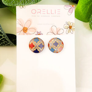 Brighten your look with these vibrant zigzag stud earrings from Orellie. Handcrafted with bold colors and a unique zigzag design, perfect for adding a pop of color to any outfit.