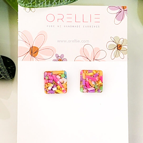 Brighten your look with these playful Confetti Square stud earrings. Handcrafted by Orellie, featuring colorful accents and a fun design perfect for any occasion.