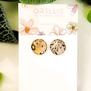 Elevate your style with these Golden Luxe Leopard stud earrings. Handcrafted by Orellie, featuring gold accents and a bold leopard pattern for a touch of glamour.