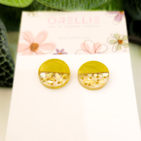 Discover our collection of Resin Circle stud earrings, available in various vibrant colors. Handcrafted by Orellie in New Zealand, these earrings are perfect for adding a touch of elegance and fun to your look.