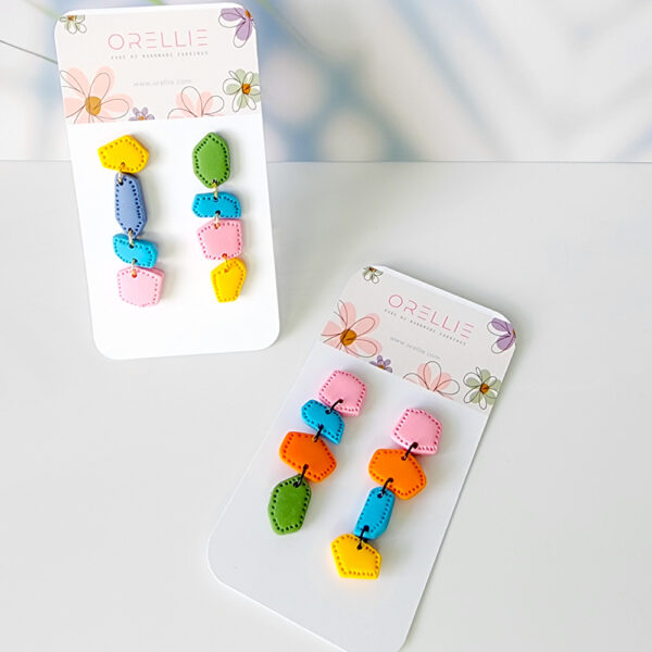 Swing into style with our Candy Carousel Dangle Earrings! These vibrant earrings bring a playful twist to any outfit, perfect for adding a splash of color and whimsy.