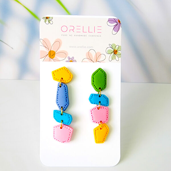 Swing into style with our Candy Carousel Dangle Earrings! These vibrant earrings bring a playful twist to any outfit, perfect for adding a splash of color and whimsy.