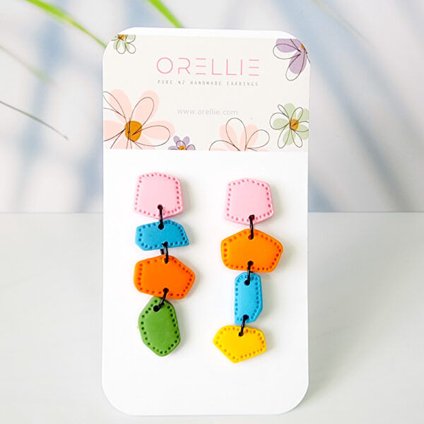 Swing into style with our Candy Carousel Dangle Earrings! These vibrant earrings bring a playful twist to any outfit, perfect for adding a splash of color and whimsy.