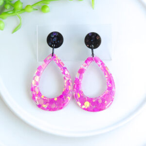 Add a touch of glam with the Pink Fizz Sparkles collection from Orellie. These statement earrings bring a pop of pink and sparkle to any look, perfect for festive events or adding a dash of fun to daily style.