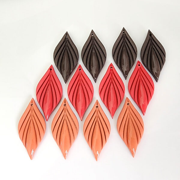 Elevate your style with our stunning collection of handcrafted leaf-shaped dangle earrings. These elegant earrings come in a variety of colors and are perfect for adding a natural and sophisticated touch to any outfit. Handmade in New Zealand by Orellie, these earrings are the perfect accessory for both casual and formal looks.