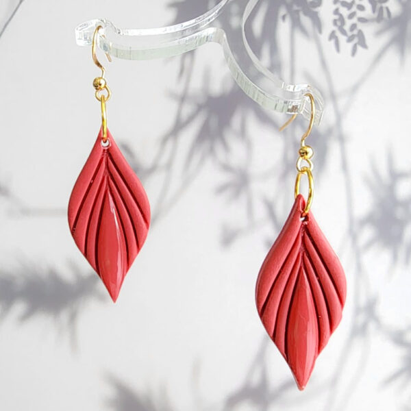 Elevate your style with our stunning collection of handcrafted leaf-shaped dangle earrings. These elegant earrings come in a variety of colors and are perfect for adding a natural and sophisticated touch to any outfit. Handmade in New Zealand by Orellie, these earrings are the perfect accessory for both casual and formal looks.