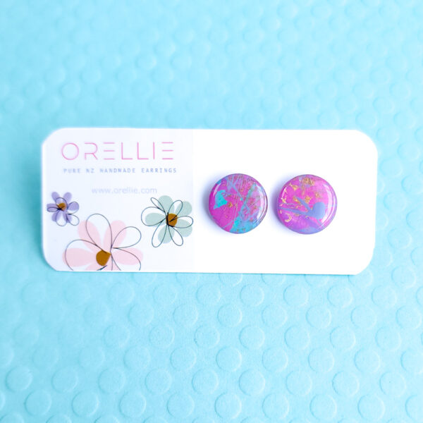 Make a statement with the hand-painted Pixie Pop Geometric Stud earrings. With their unique shape and vibrant colors, these earrings are a stylish addition to any accessory collection.