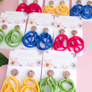 Bring a splash of vibrant charm to your wardrobe with the Lush Swirls earrings from Orellie. These playful, colorful designs are perfect for making a statement, crafted with care in New Zealand