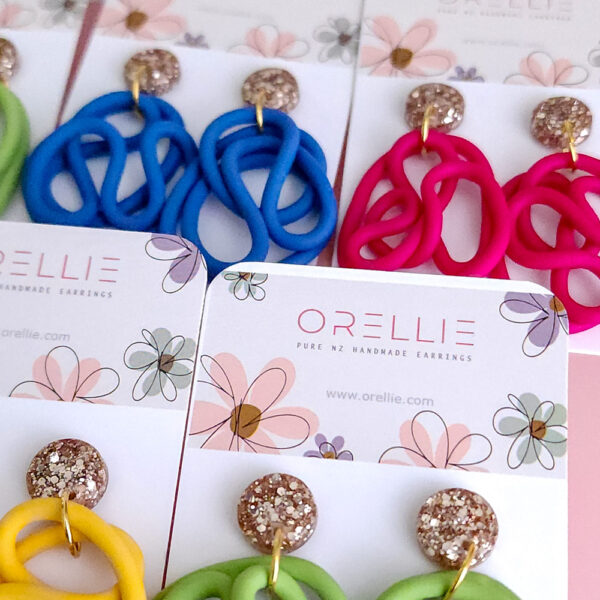 Bring a splash of vibrant charm to your wardrobe with the Lush Swirls earrings from Orellie. These playful, colorful designs are perfect for making a statement, crafted with care in New Zealand