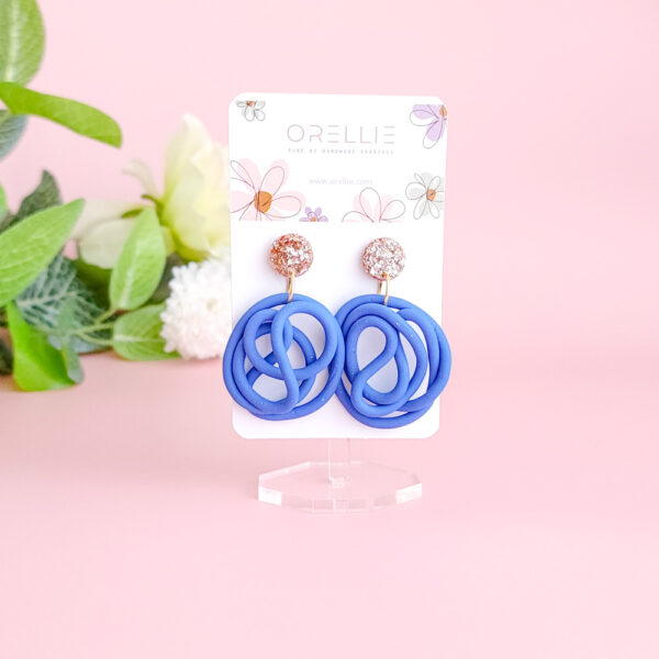 Bring a splash of vibrant charm to your wardrobe with the Lush Swirls earrings from Orellie. These playful, colorful designs are perfect for making a statement, crafted with care in New Zealand