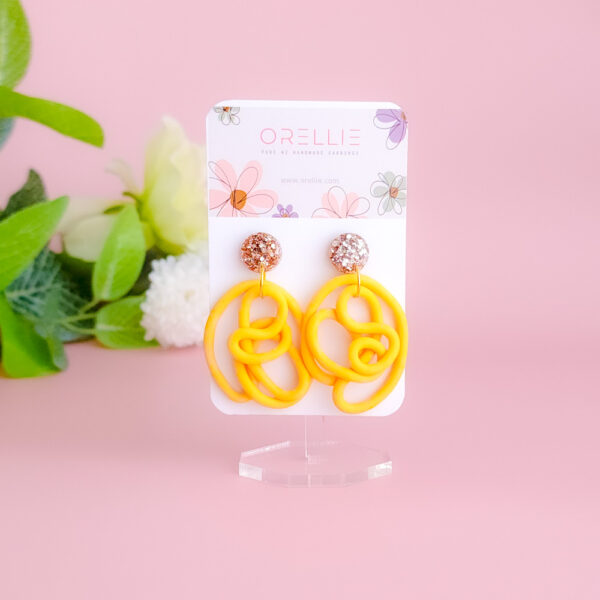 Bring a splash of vibrant charm to your wardrobe with the Lush Swirls earrings from Orellie. These playful, colorful designs are perfect for making a statement, crafted with care in New Zealand