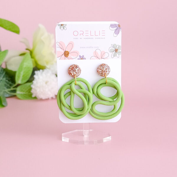 Bring a splash of vibrant charm to your wardrobe with the Lush Swirls earrings from Orellie. These playful, colorful designs are perfect for making a statement, crafted with care in New Zealand