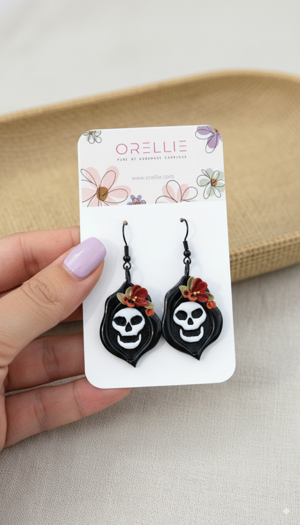 Stand out this spooky season with the “Spooky Bloom” handmade earrings from Orellie NZ. Featuring a unique skull design adorned with delicate florals, these polymer clay dangles are the perfect blend of eerie and elegant — ideal for Halloween parties, gothic styles, or alternative fashion lovers. Discover handcrafted charm with a bold twist.