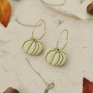Celebrate the season with these handmade Halloween pumpkin earrings from Orellie. Lightweight, hypoallergenic, and available in vibrant fall colors – perfect for autumn vibes.