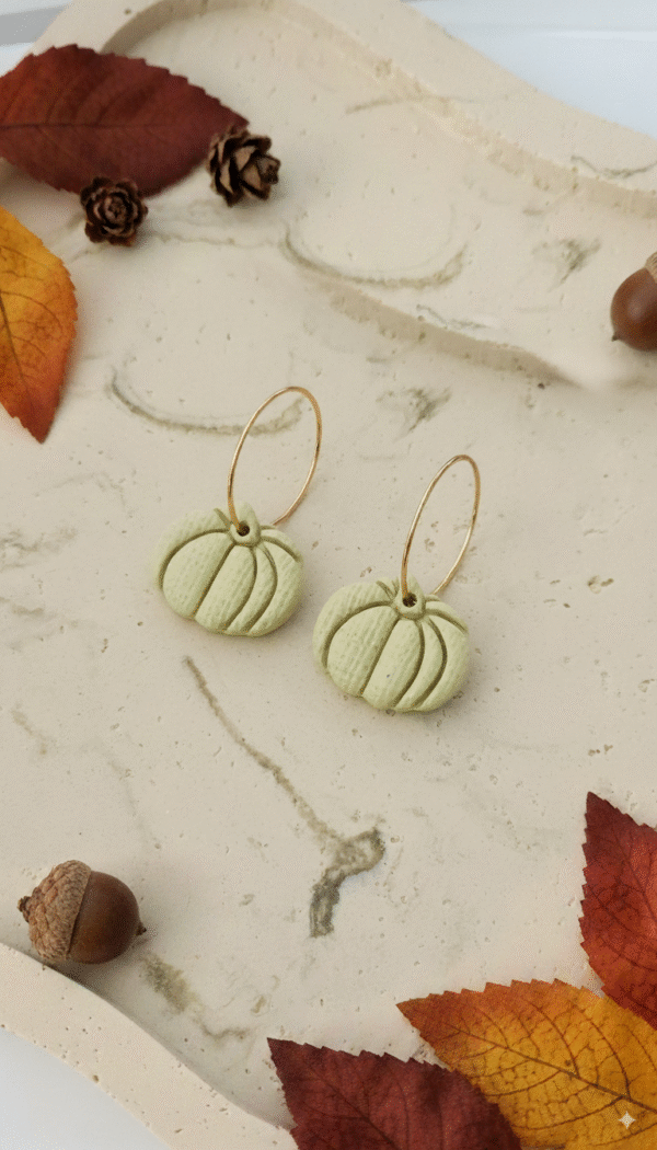 Celebrate the season with these handmade Halloween pumpkin earrings from Orellie. Lightweight, hypoallergenic, and available in vibrant fall colors – perfect for autumn vibes.