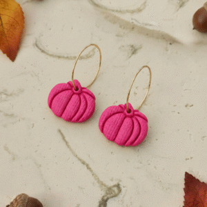 Celebrate the season with these handmade Halloween pumpkin earrings from Orellie. Lightweight, hypoallergenic, and available in vibrant fall colors – perfect for autumn vibes.