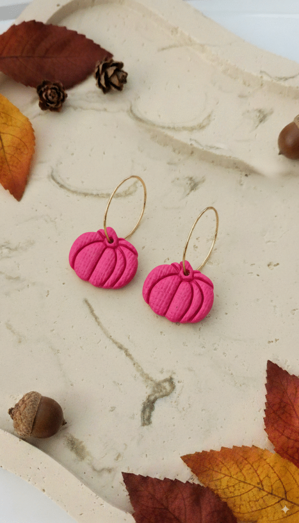 Celebrate the season with these handmade Halloween pumpkin earrings from Orellie. Lightweight, hypoallergenic, and available in vibrant fall colors – perfect for autumn vibes.