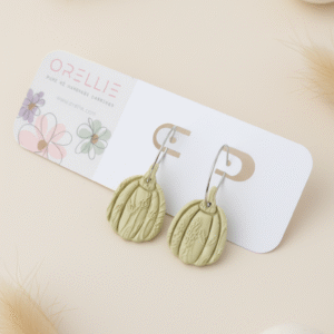 Celebrate Halloween with elegance. These handmade terracotta pumpkin earrings feature botanical embossing for a rustic, minimal, and seasonal look. Perfect for fall lovers