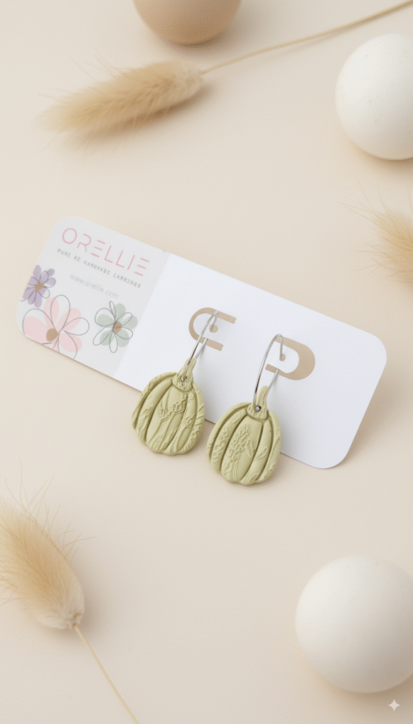 Celebrate Halloween with elegance. These handmade terracotta pumpkin earrings feature botanical embossing for a rustic, minimal, and seasonal look. Perfect for fall lovers
