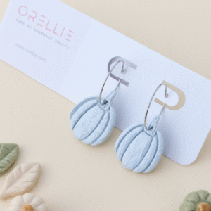 Celebrate Halloween with elegance. These handmade terracotta pumpkin earrings feature botanical embossing for a rustic, minimal, and seasonal look. Perfect for fall lovers!