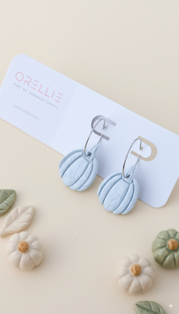 Celebrate Halloween with elegance. These handmade terracotta pumpkin earrings feature botanical embossing for a rustic, minimal, and seasonal look. Perfect for fall lovers!