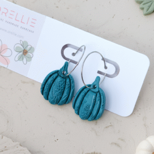 Celebrate Halloween with elegance. These handmade terracotta pumpkin earrings feature botanical embossing for a rustic, minimal, and seasonal look. Perfect for fall lovers!