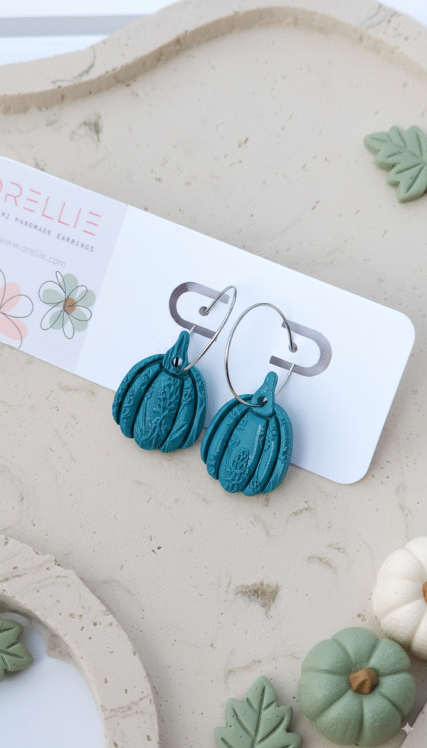 Celebrate Halloween with elegance. These handmade terracotta pumpkin earrings feature botanical embossing for a rustic, minimal, and seasonal look. Perfect for fall lovers!