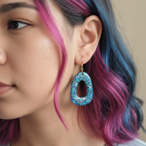 Shimmer, sparkle, and shine with our Glimmerloop earrings — handcrafted resin loops infused with radiant glitter. Light, bold, and utterly eye-catching.